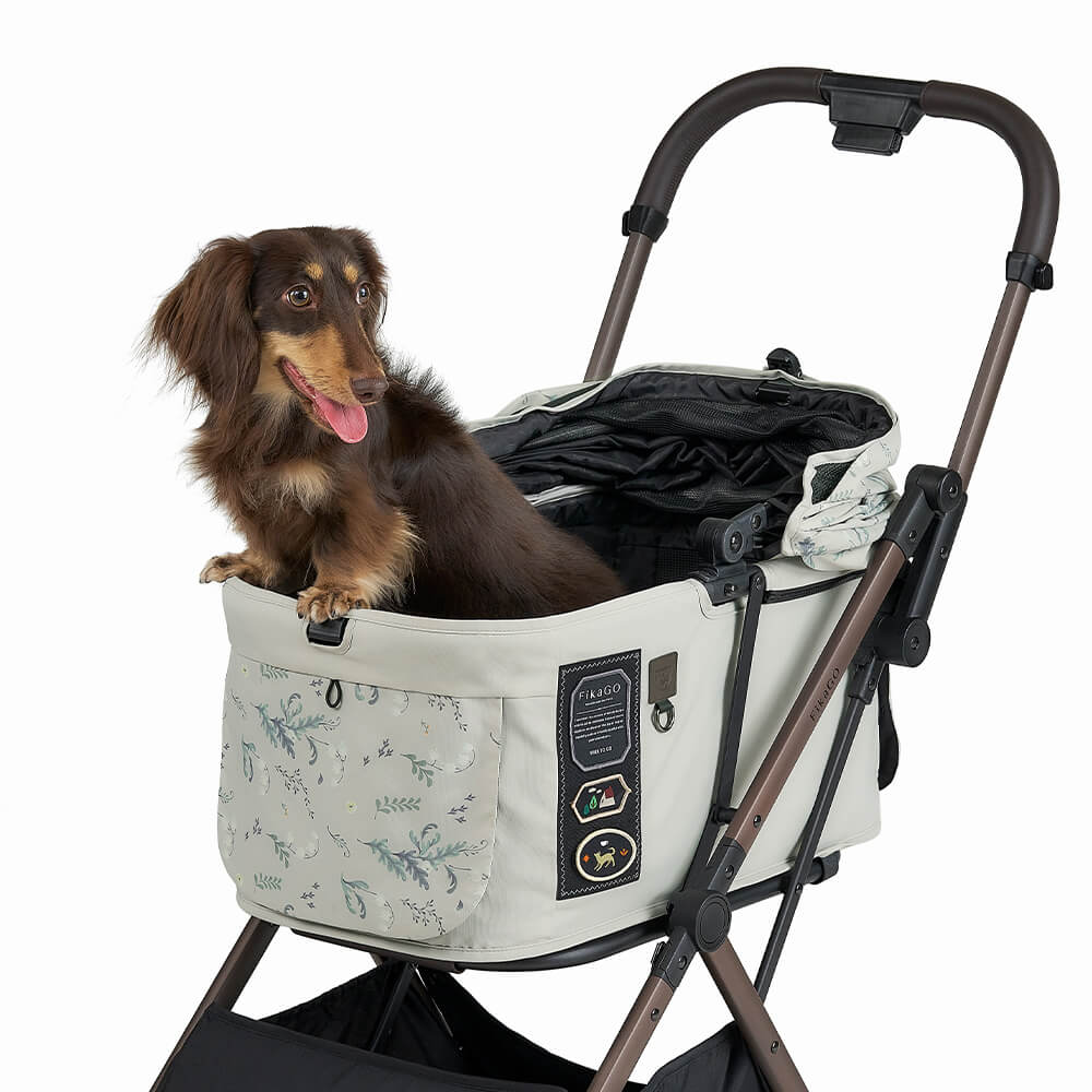 FikaGO FREE TO GO 2 pet stroller with a dog standing in the cabin three-quarter view in pink