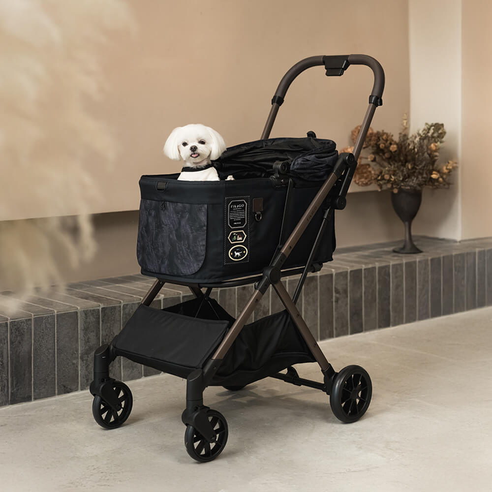 FikaGO FREE TO GO 2 pet stroller with a maltese standing in the cabin three-quarter view in strolling letters