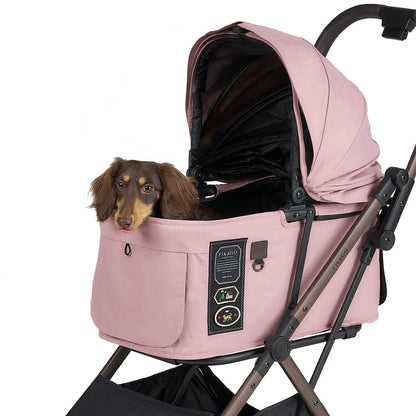 FikaGO FREE TO GO 2 pet stroller with a dog lying on the cabin three-quarter view in pink