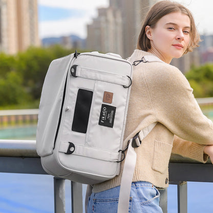 Person wearing FikaGO TRUFFLE carry-on pet bag as a backpack in creamy cloud